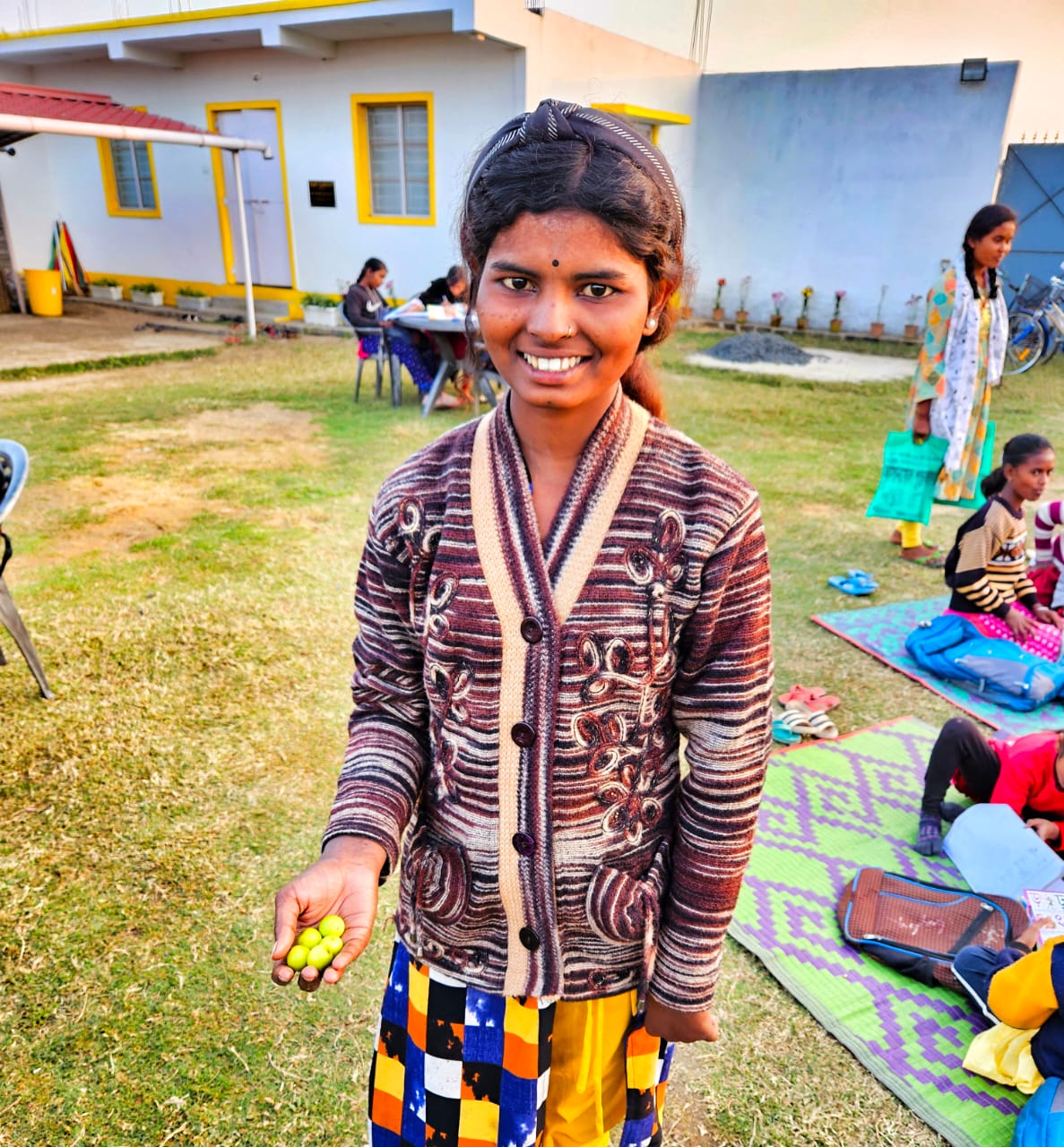 Girl smiling at FEED program